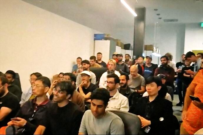 the packed room watching the lightning demos