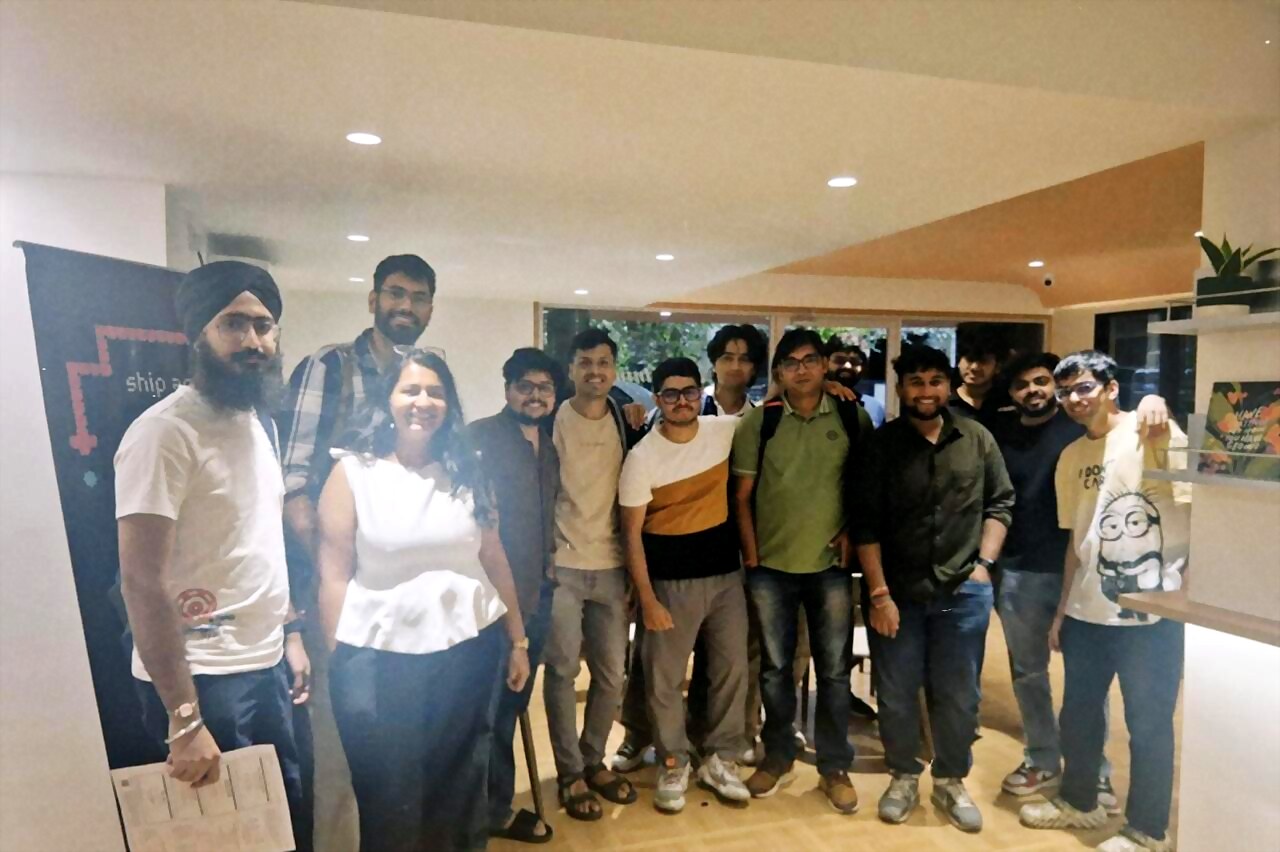 group photo of everyone who came, beside the failproof ai banner